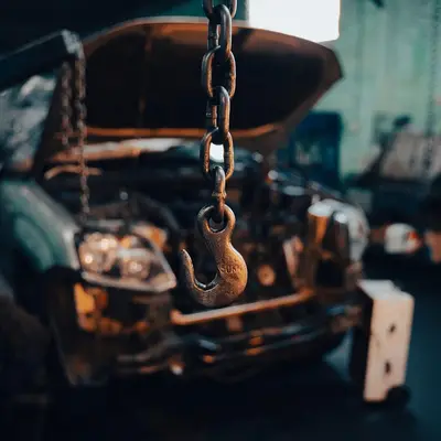 Engine lifted on a workshop hoist