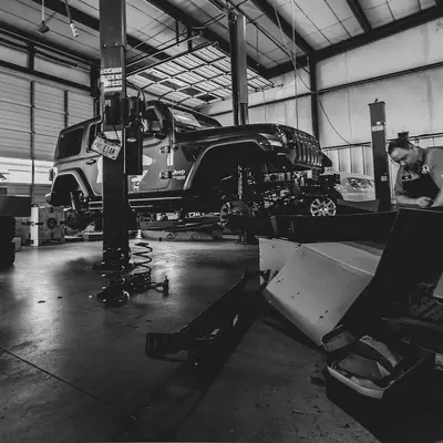 Car raised on a garage lift