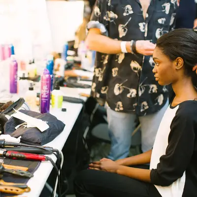A client having her hair styled