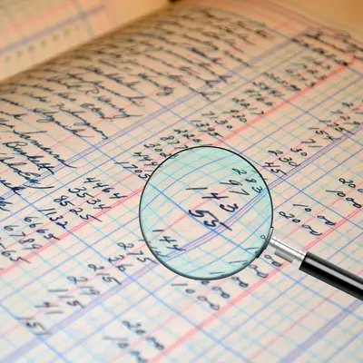 Ledger under a magnifying glass