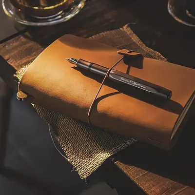 Leather notebook and pen